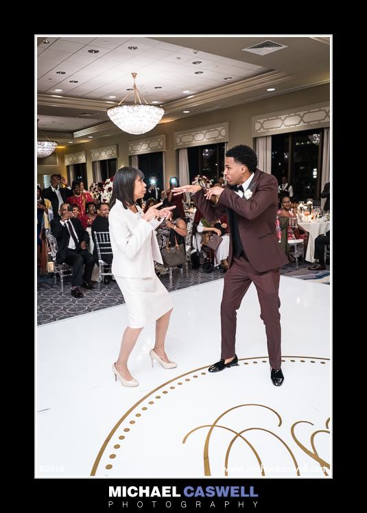 Groom dances with his mother