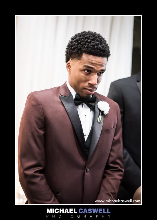 Groom sees his bride walking down the aisle