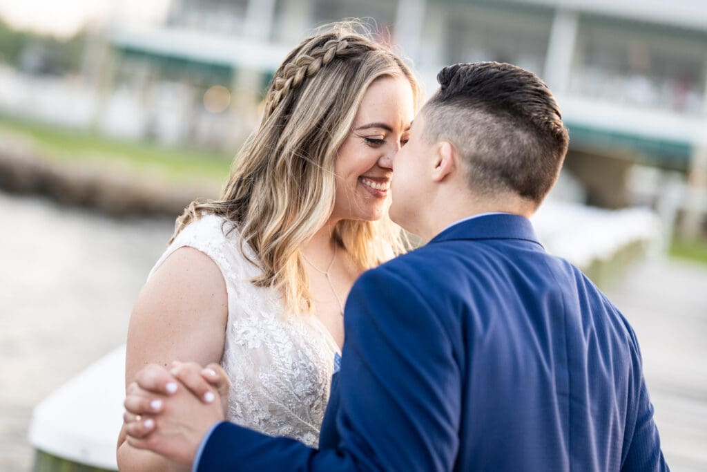 Portrait of couple in sun at Bay Waveland Yacht Club wedding