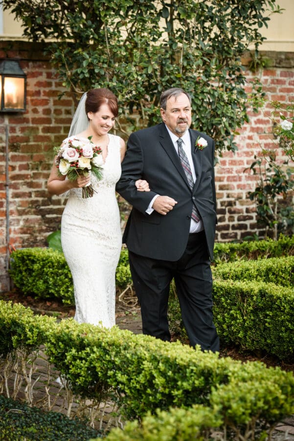 Bride and father walk down aisle at Beauregard-Keyes House wedding