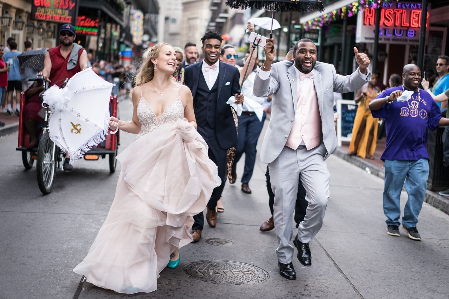 Bride and groom second line in the French Quarter