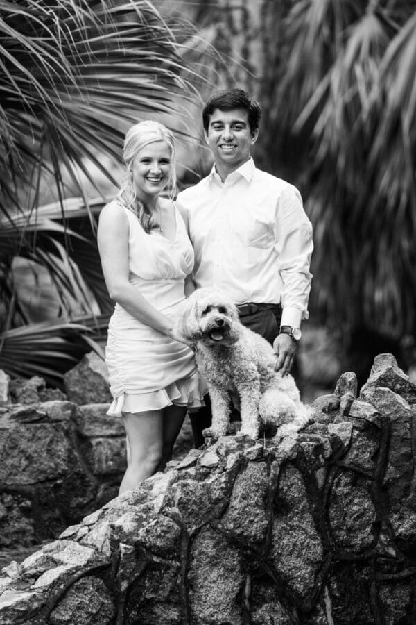 Couple on bridge in City Park with dog