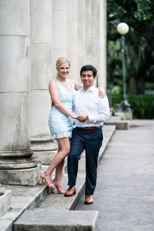 Couple standing by Peristyle in City Park