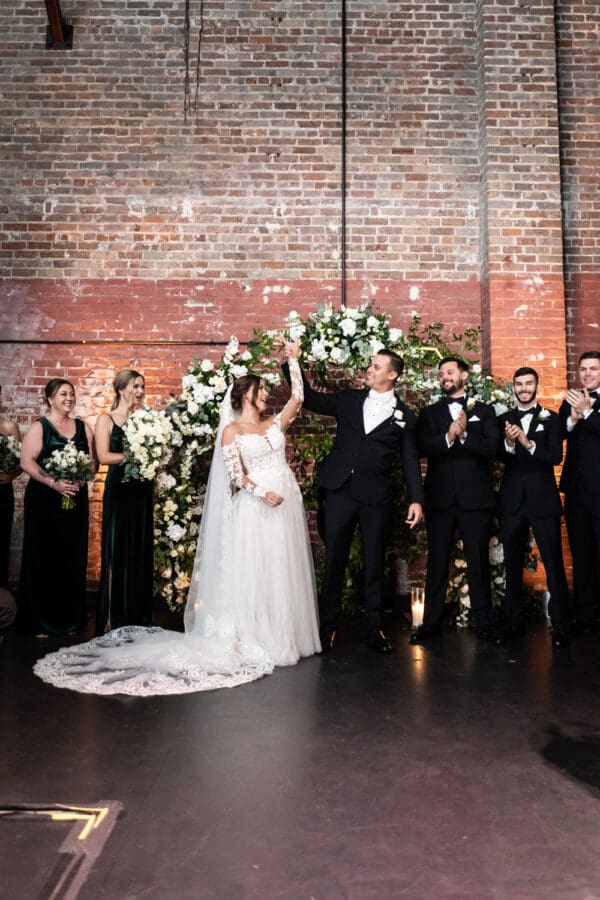 Bride and groom celebrate wedding ceremony at Civic Theatre