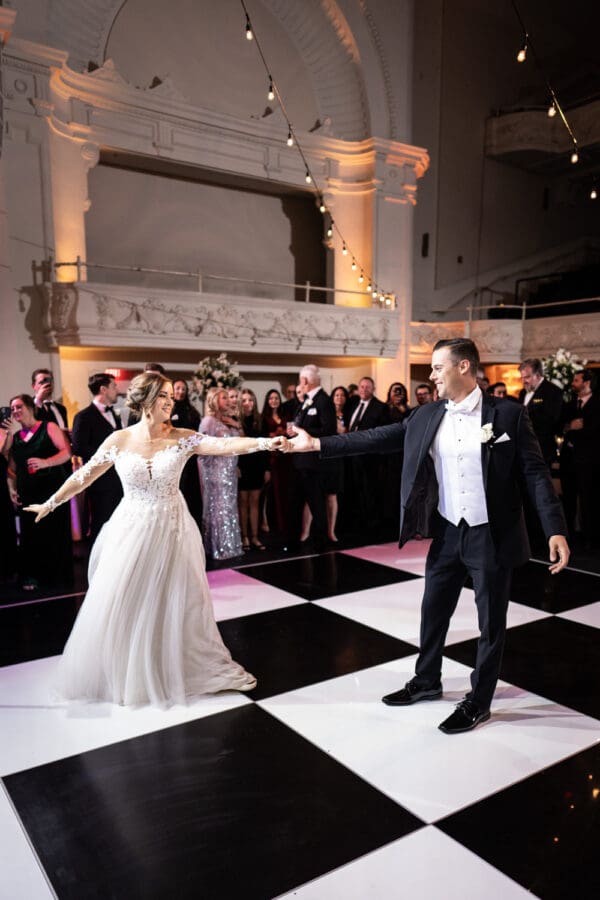 Bride and groom have their first dance at Civic Theatre wedding reception