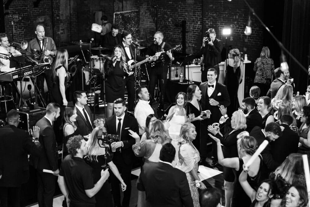 Bride and groom dancing with guests at Civic Theatre