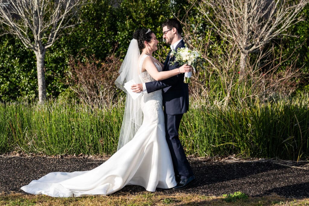 Bride and groom first look in Crescent Park