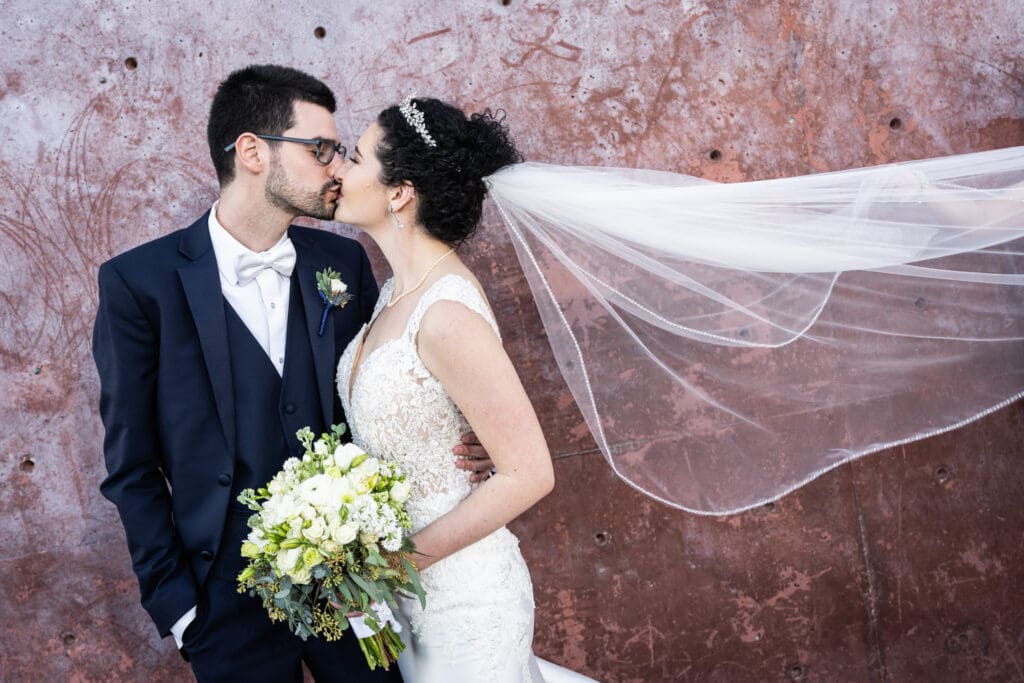 Bride and groom on Piety Wharf in Crescent Park