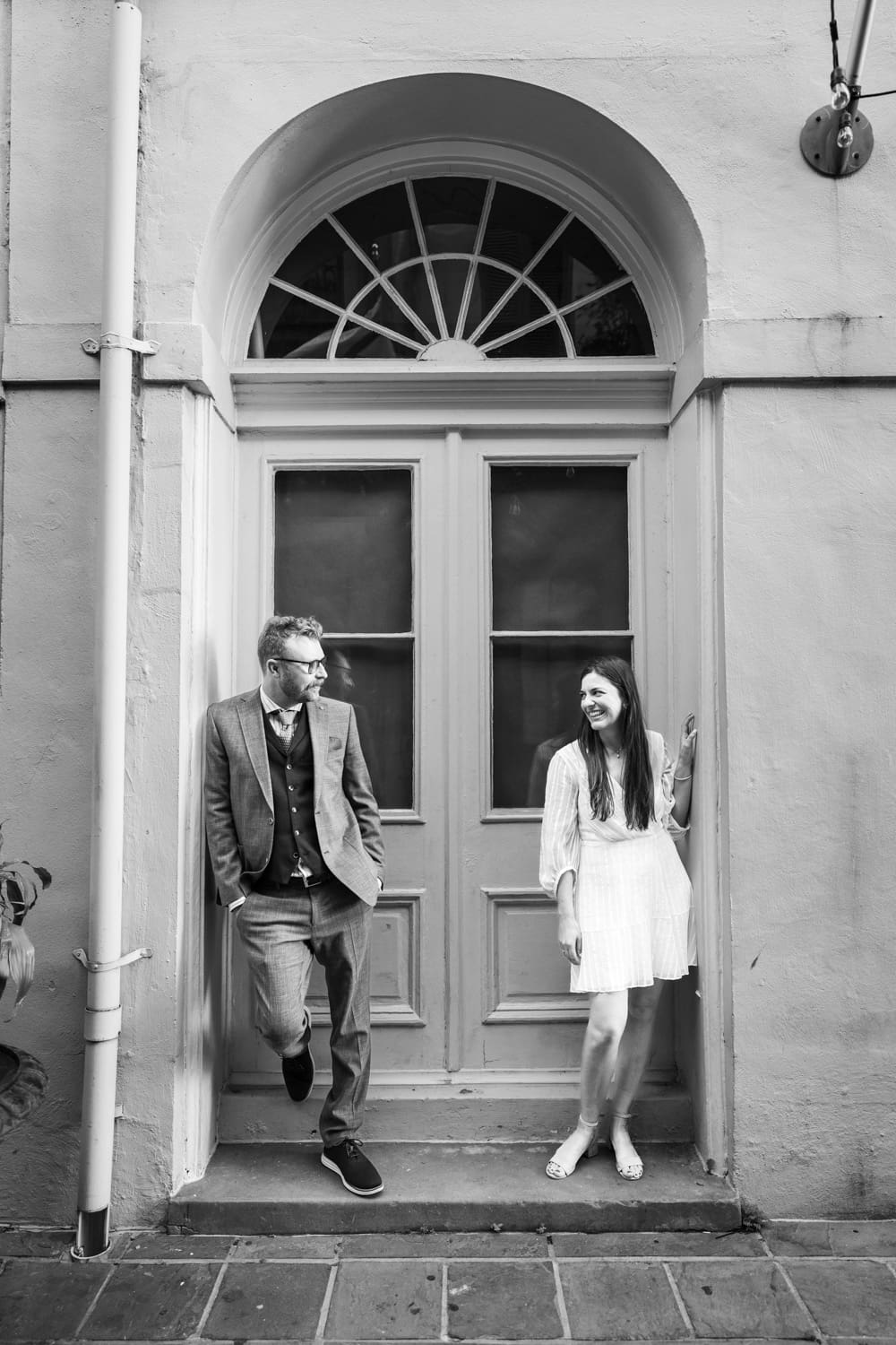 Couple standing in French Quarter doorway