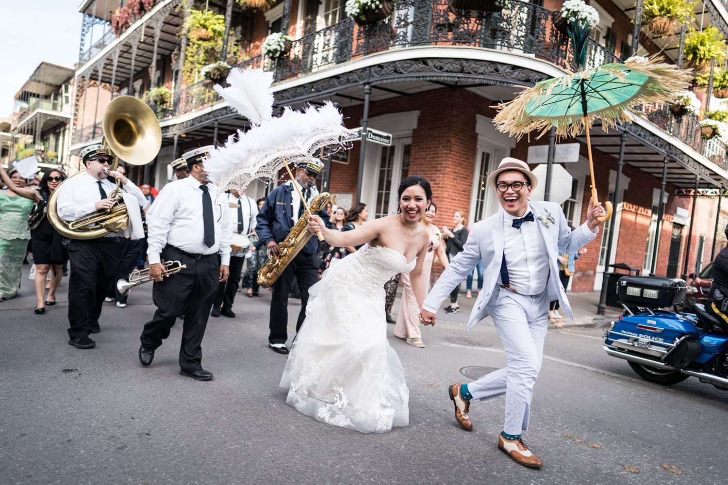 Second line parade past the Miltenberger House in the French Quarter