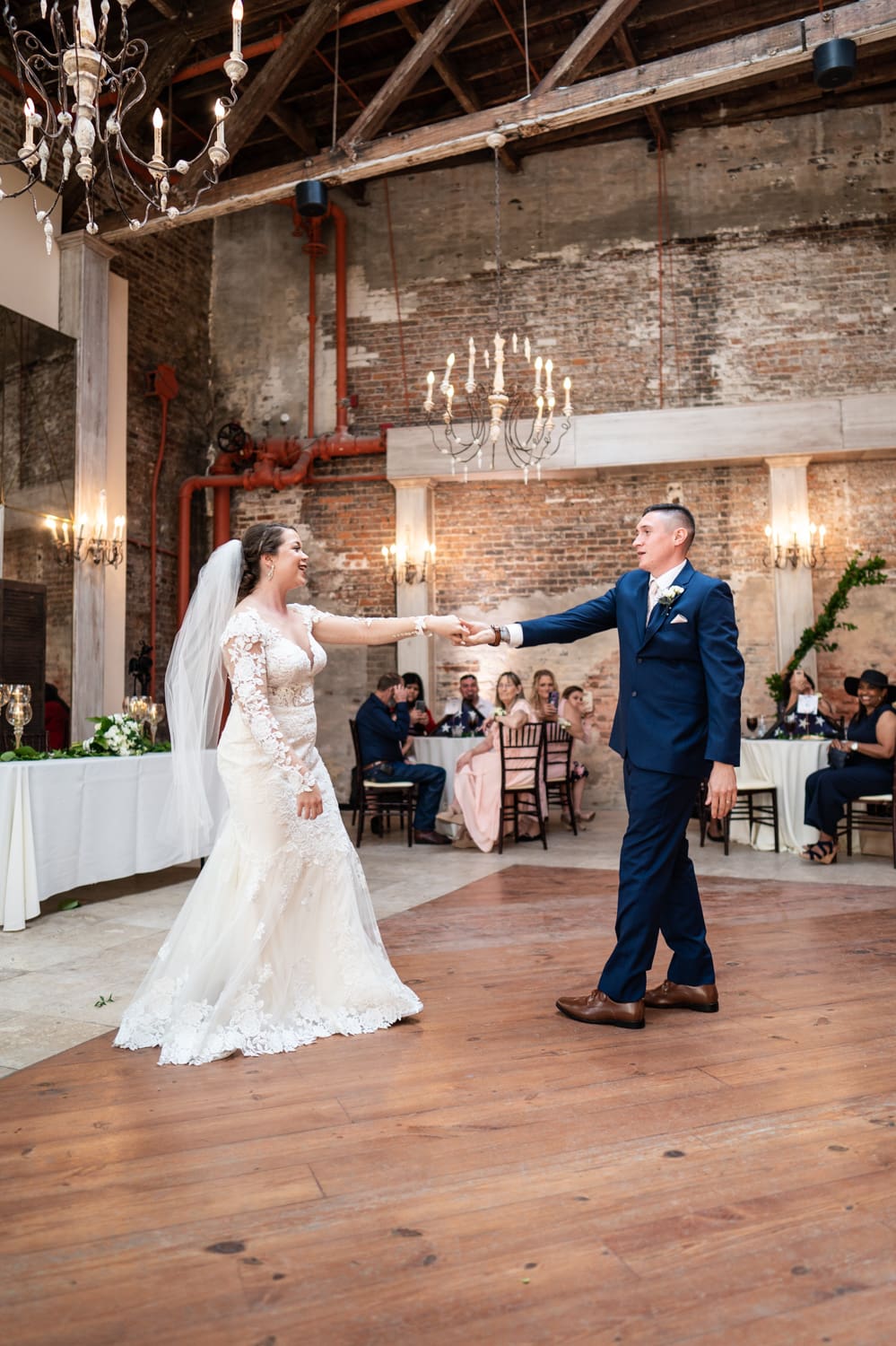 Bride and groom dance during Gallery Venue at Tomas Bistro wedding in New Orleans