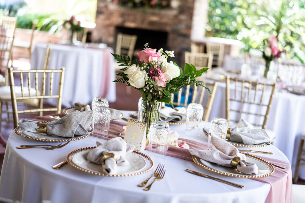 Cotton Blossom Florals centerpiece on wedding reception table