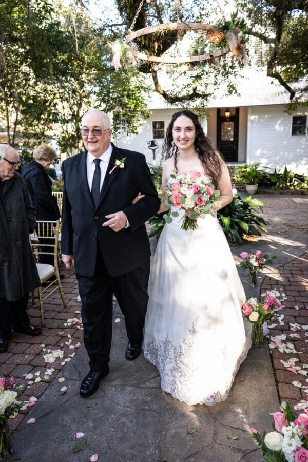 Bride walks down aisle with father at Henry Smith House wedding