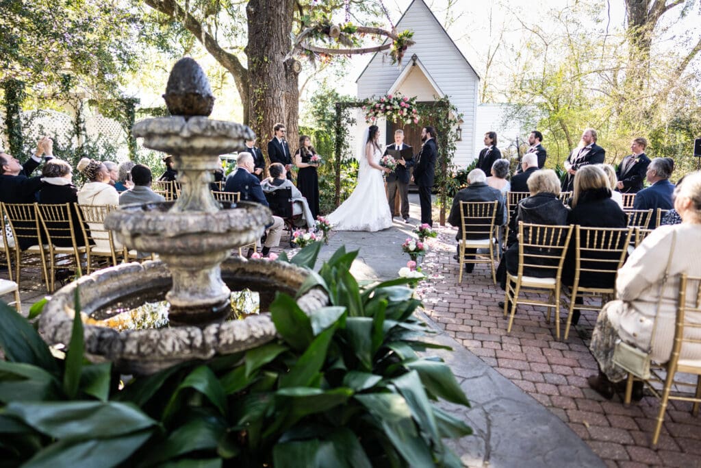 Wedding ceremony in front of chapel at Henry Smith House in Picayune