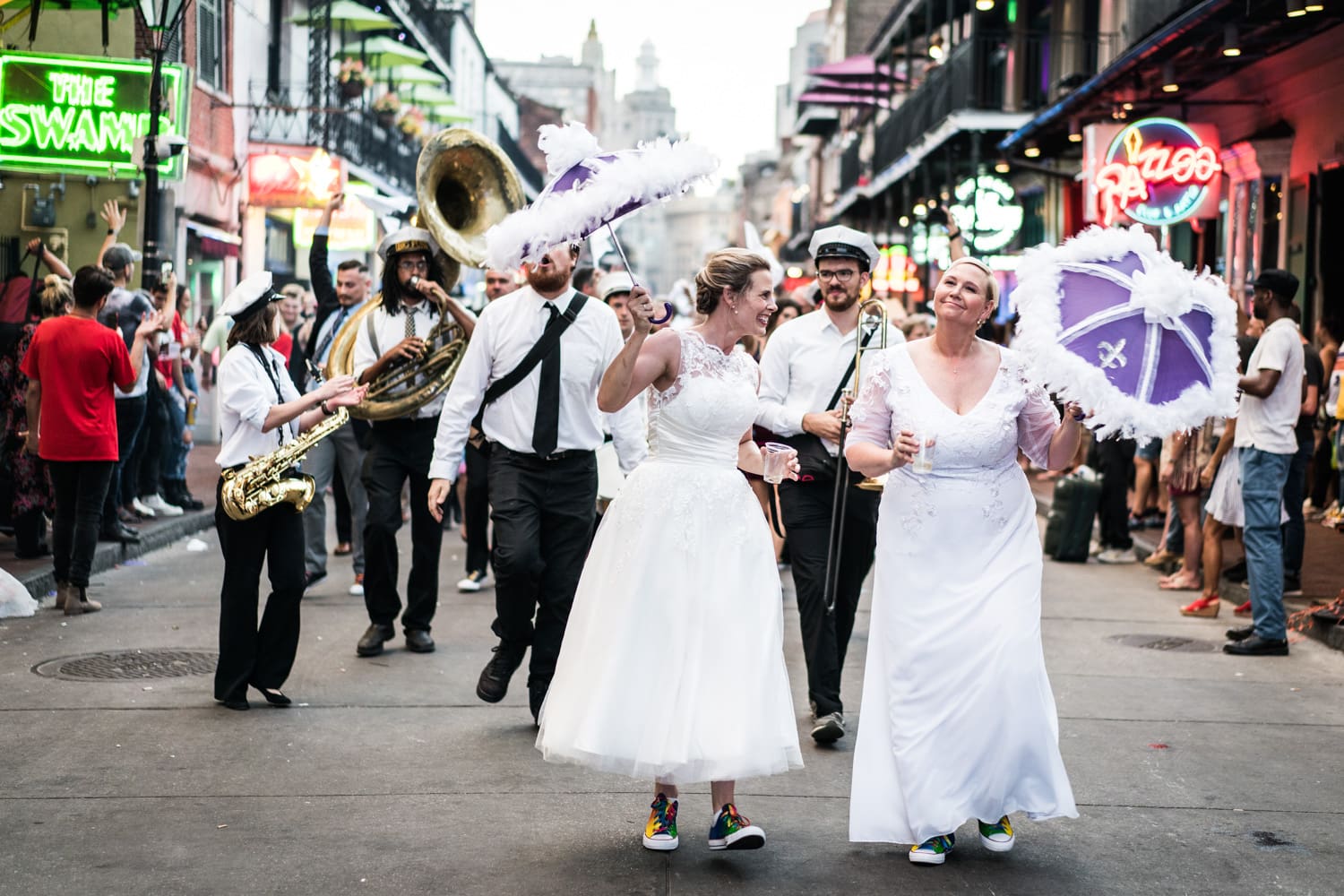 Brides second-line through French Quarter