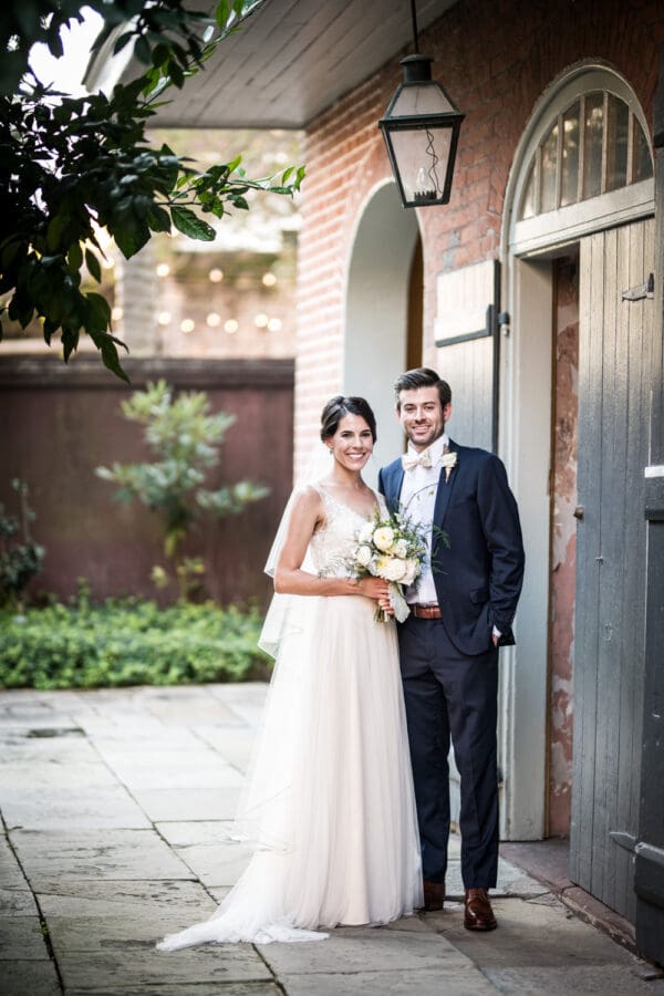 Bride and groom portrait in Hermann-Grima House courtyard