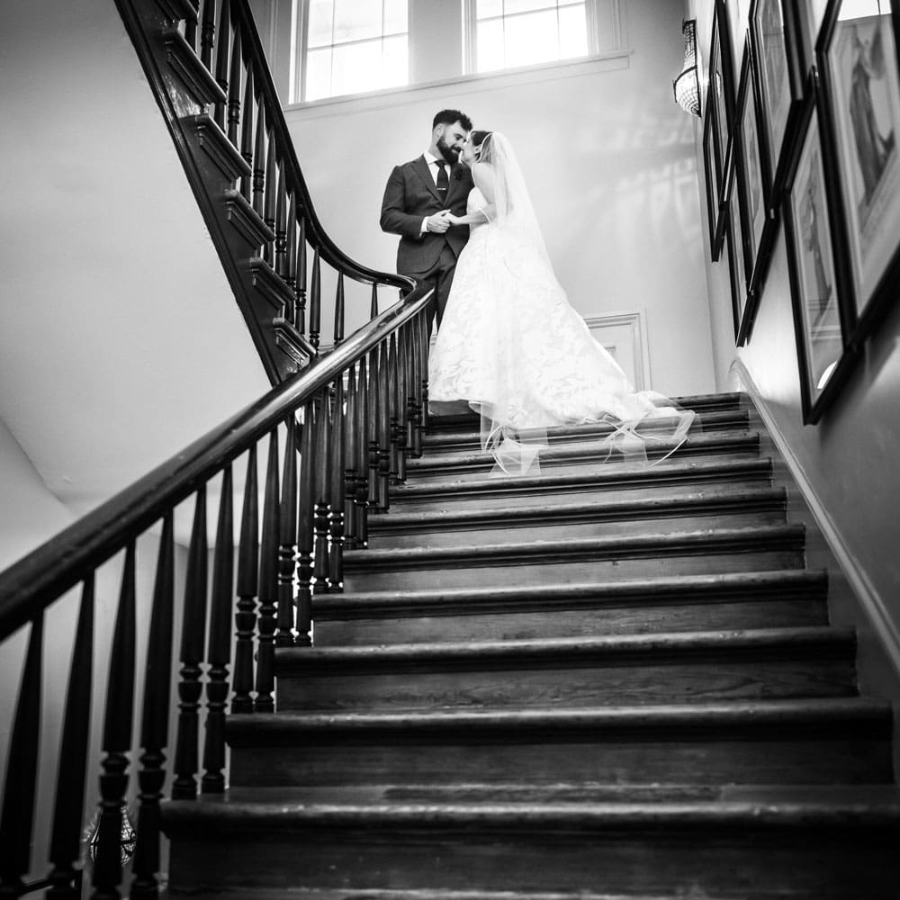 Bride and groom on stairs at Hotel St. Vincent wedding