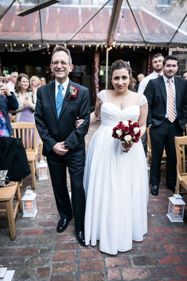 Bride and father walk down aisle at House of Blues wedding