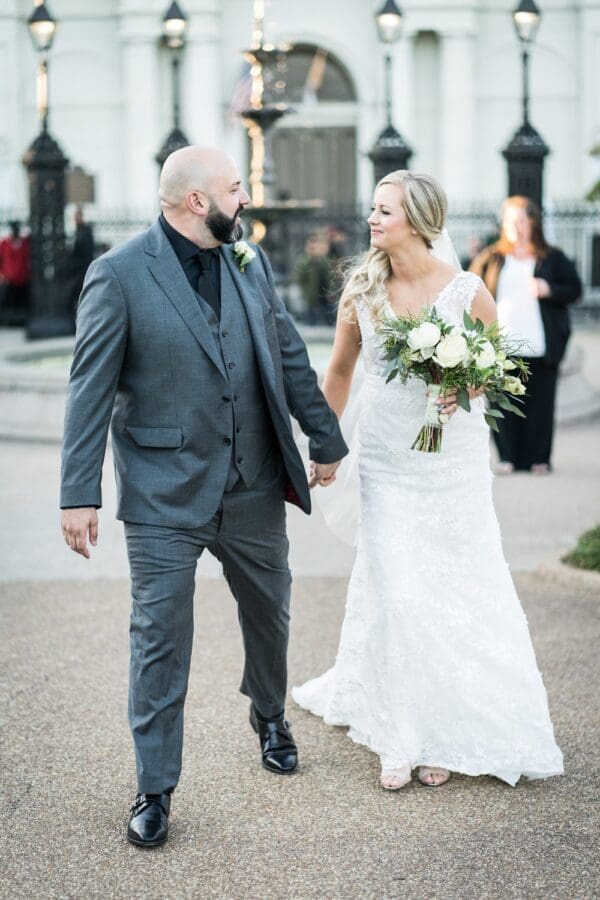 Bride and groom walking out after Jackson Square wedding