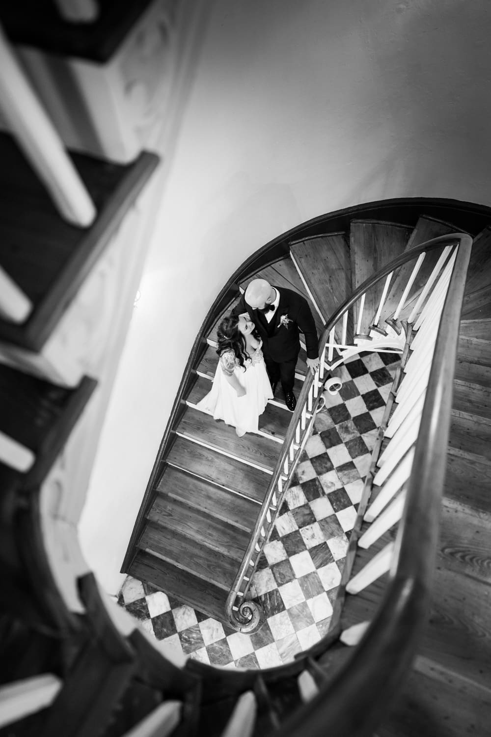 Bride and groom on stairs at Latrobe's on Royal wedding