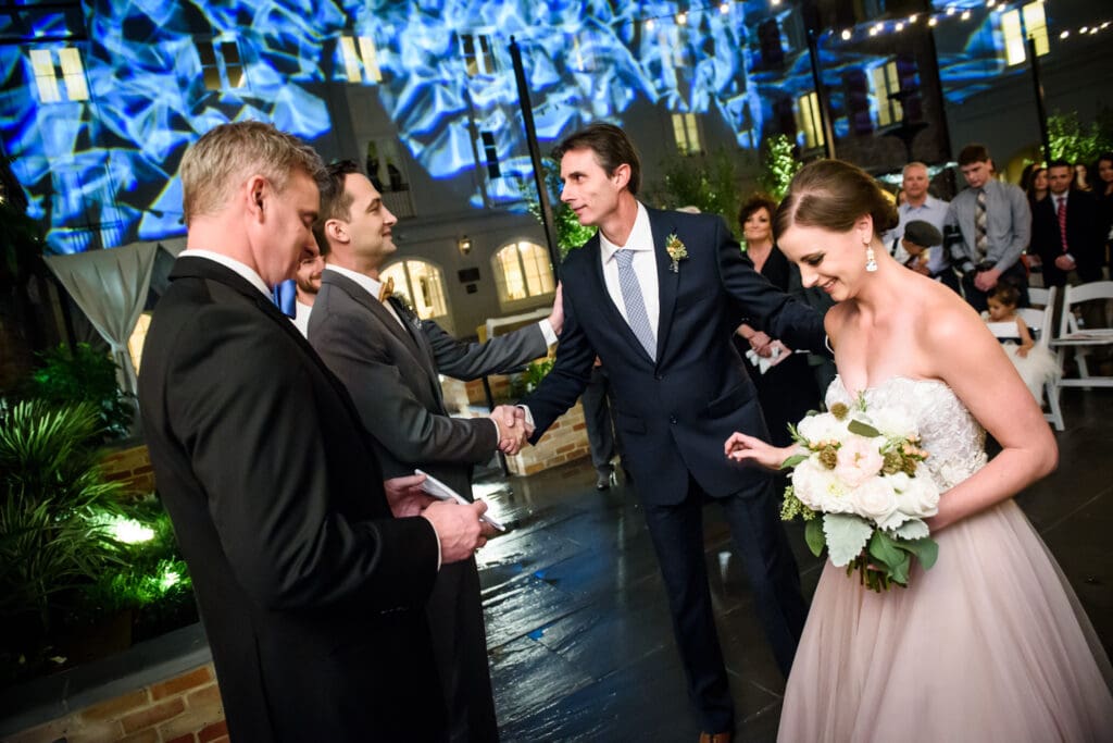 Father gives bride away at Maison Dupuy Hotel