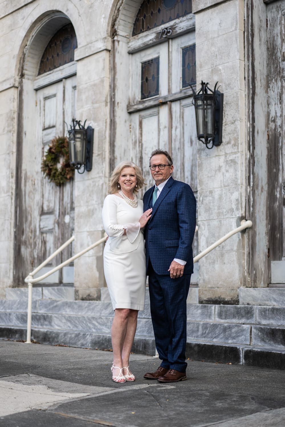 Couple standing in front of Marigny Opera House