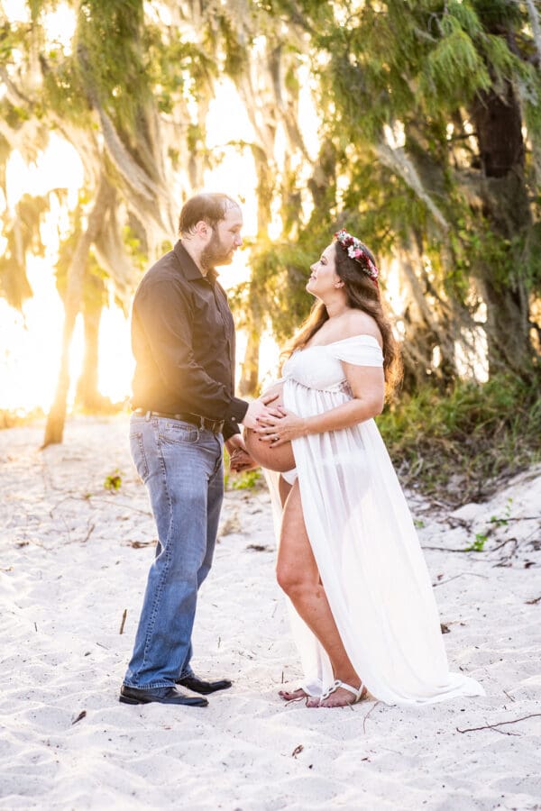 Maternity portrait session on beach at Fontainebleau State Park in Mandeville