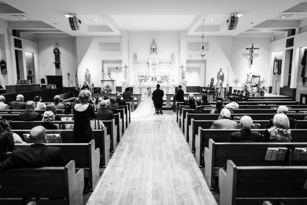 View of wedding ceremony from back of church