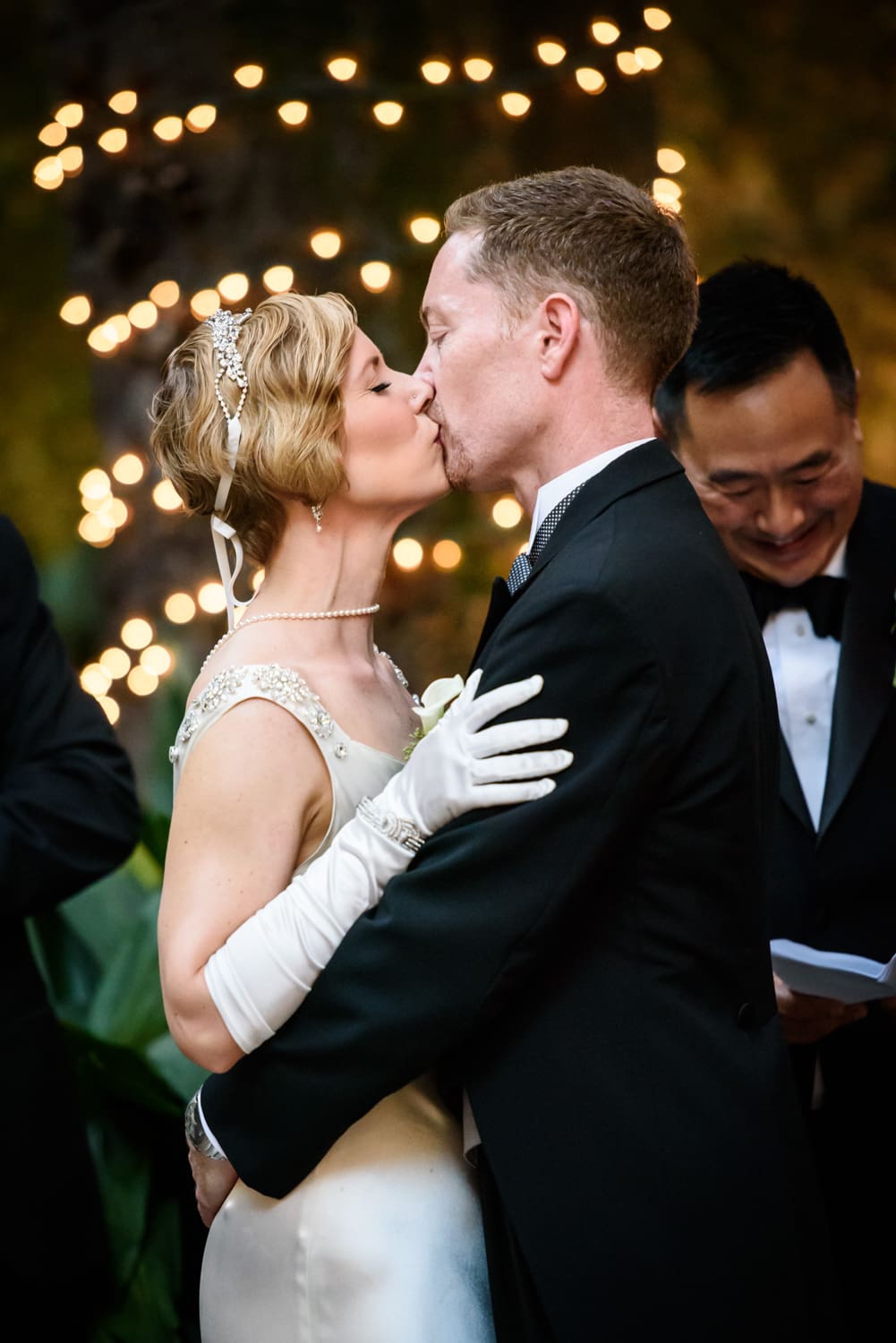 Bride and groom kiss at Montegut House wedding