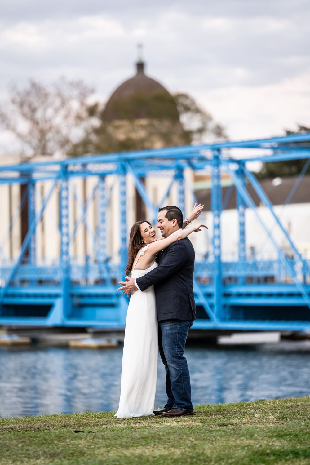 Engagement portrait of couple by Cabrini Bridge