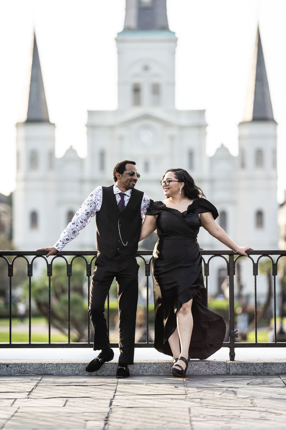 Couple standing in front of St. Louis Cathedral in New Orleans