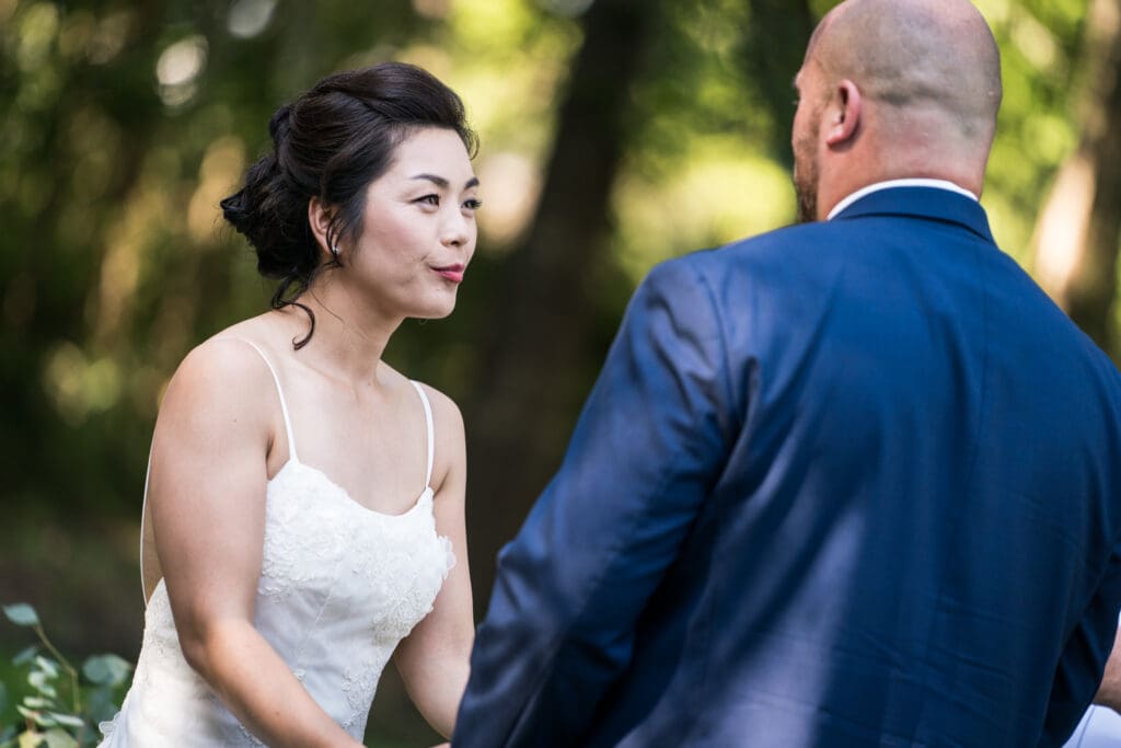 Bride smiles at groom