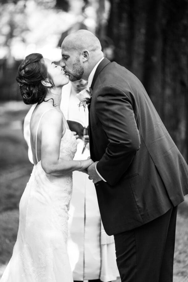Bride and groom kiss