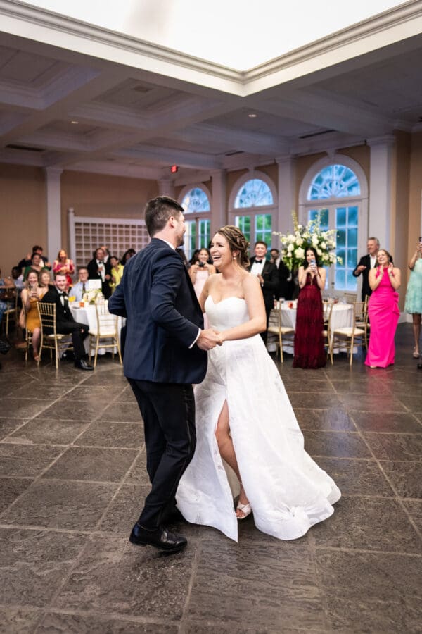 Bride and groom dance at Pavilion of the Two Sisters wedding