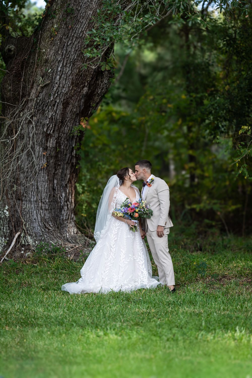 Bride and groom kissing in Bay St. Louis Mississippi