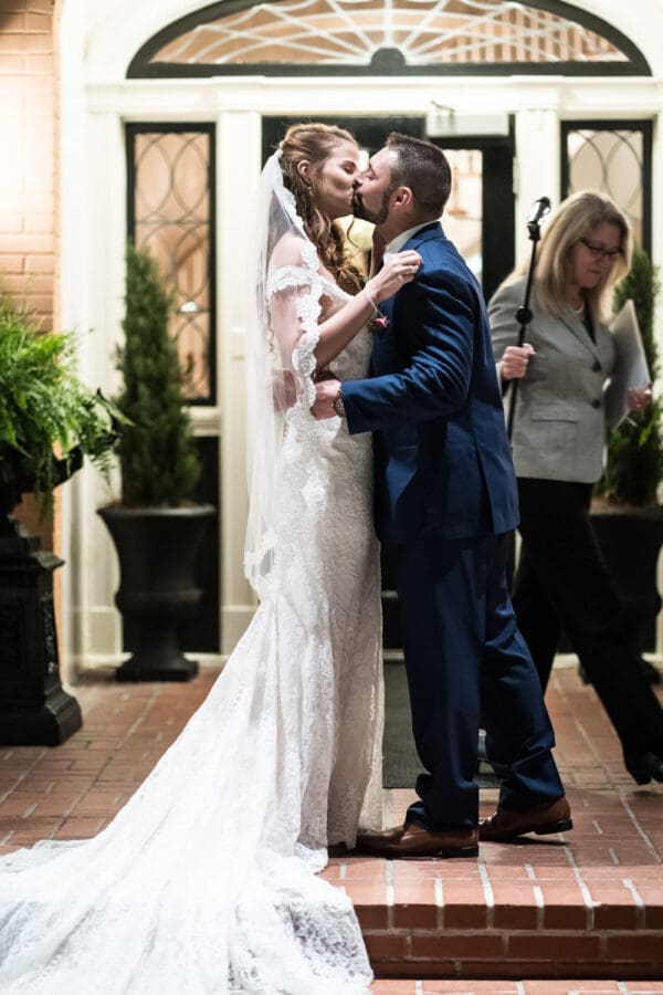 Bride and groom kiss
