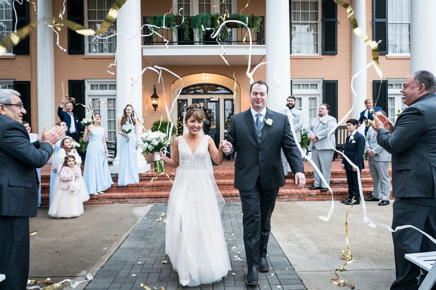 Couple getting streamer send-off at Southern Oaks wedding