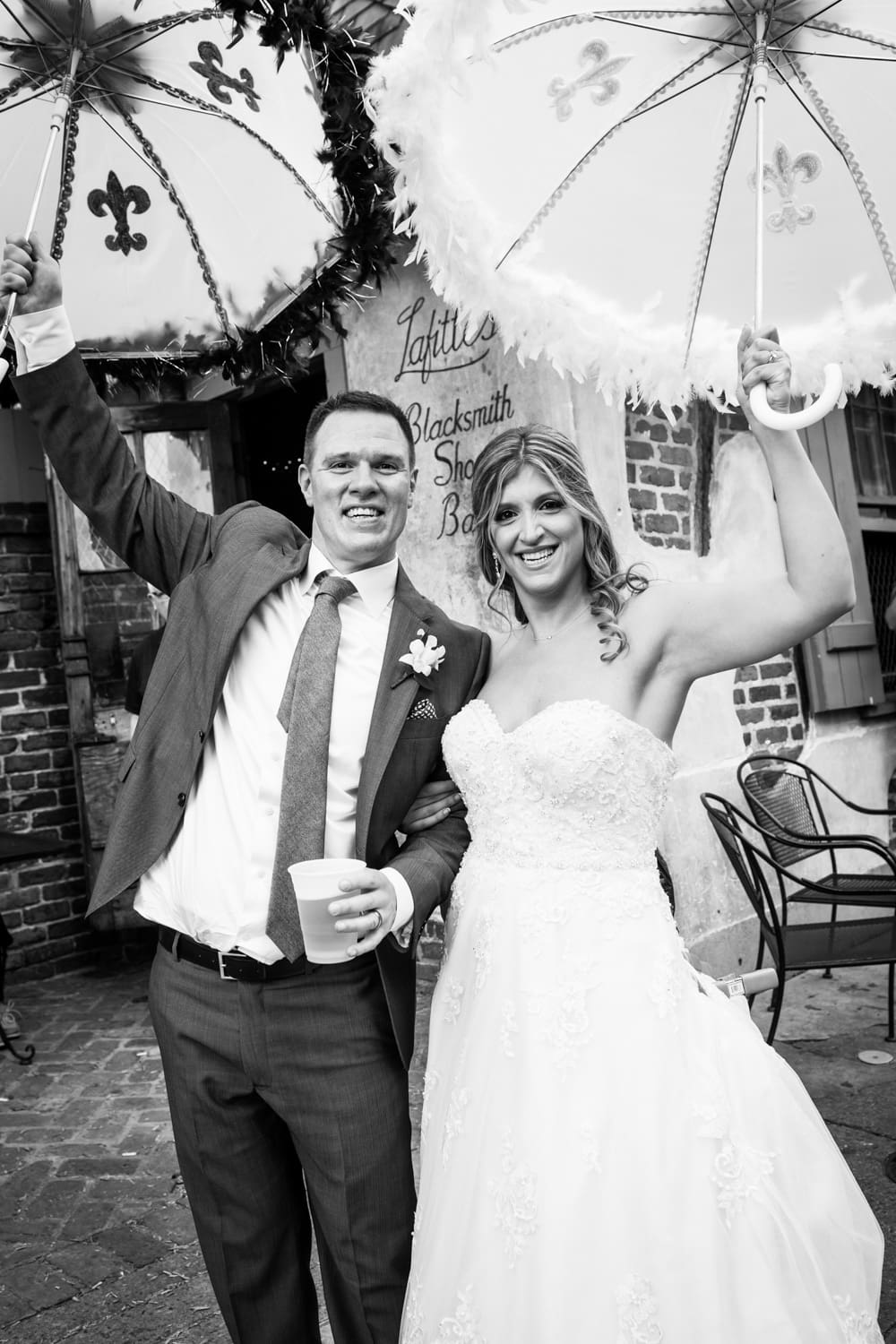 Bride and groom second line parade in New Orleans