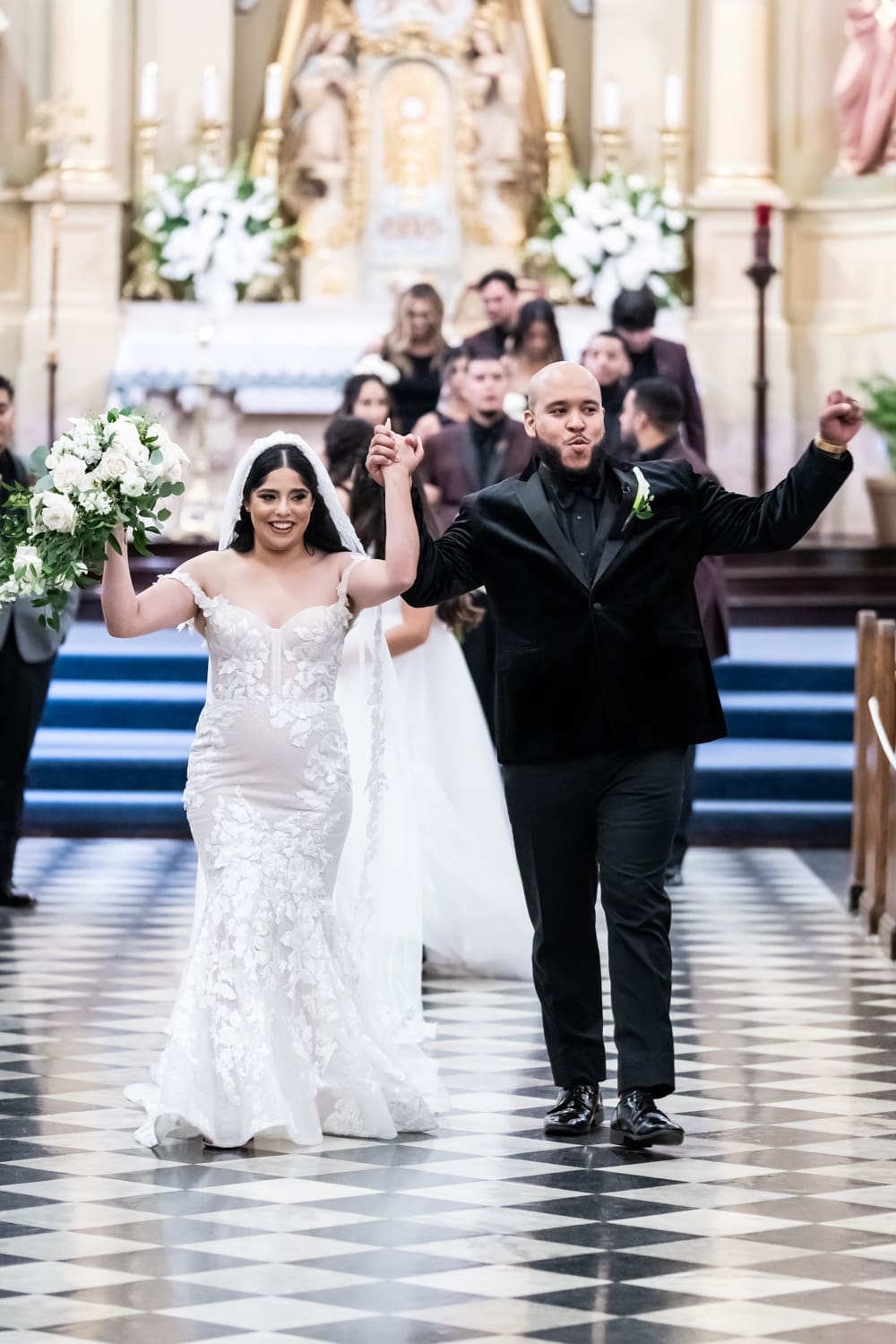 Couple walking down aisle at St. Louis Cathedral wedding