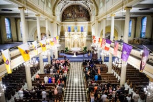 Wide-angle photo of St. Louis Cathedral wedding ceremony