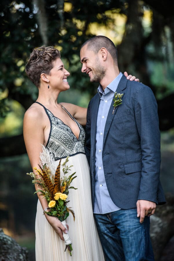 Couple smiles at each other in Audubon Park