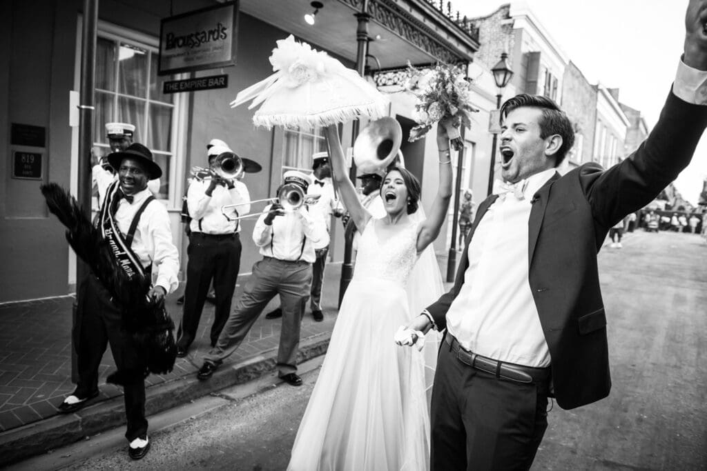 Bride and groom arrive at Broussard's wedding reception