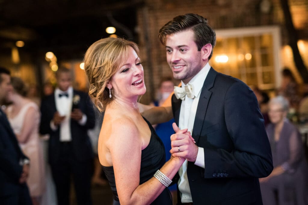 Groom and mother dancing