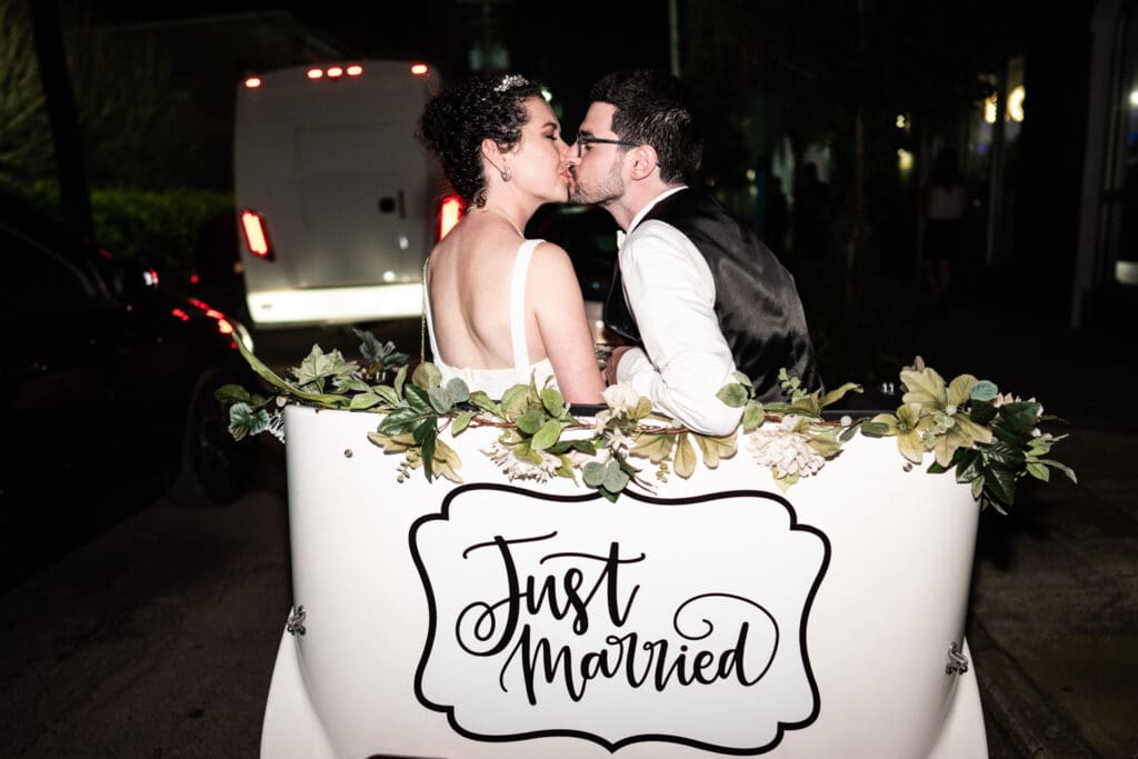 Bride and groom leaving in pedicab