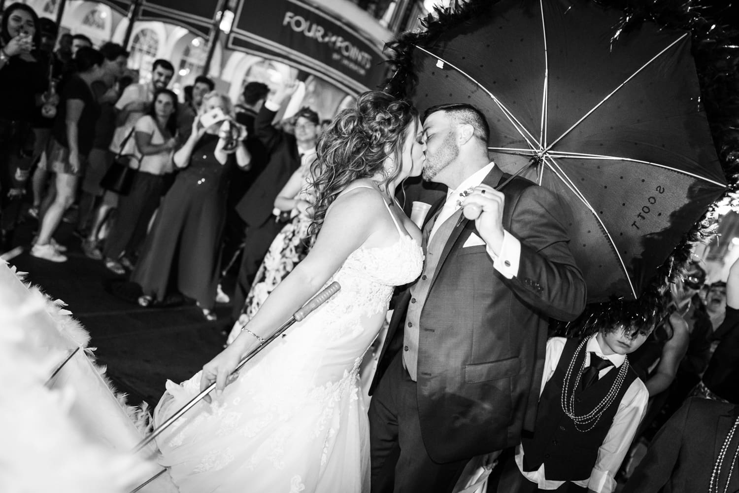 Couple kissing at Chateau Le Moyne wedding reception