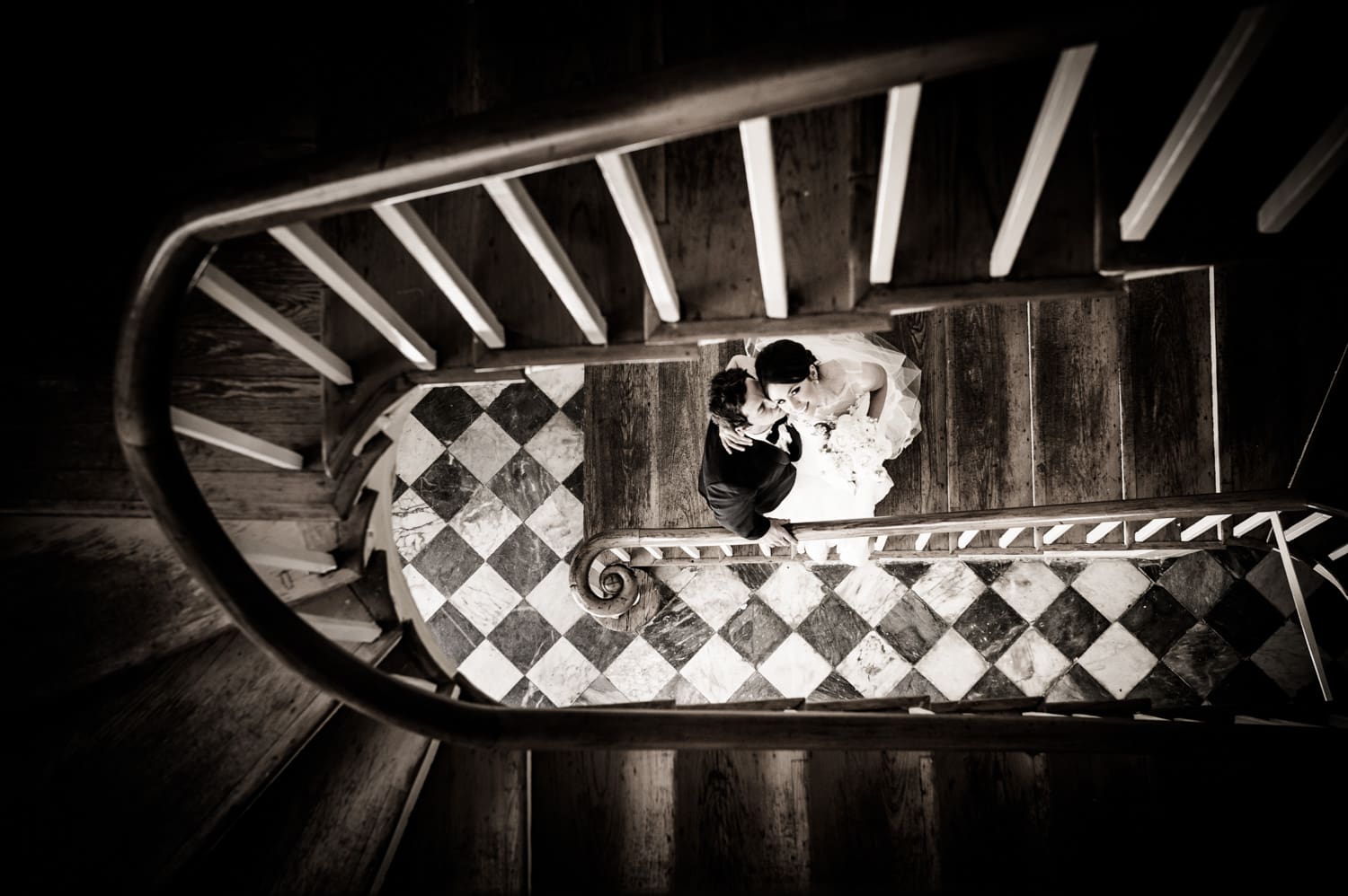 Bride and groom on stairs at Latrobe's on Royal wedding