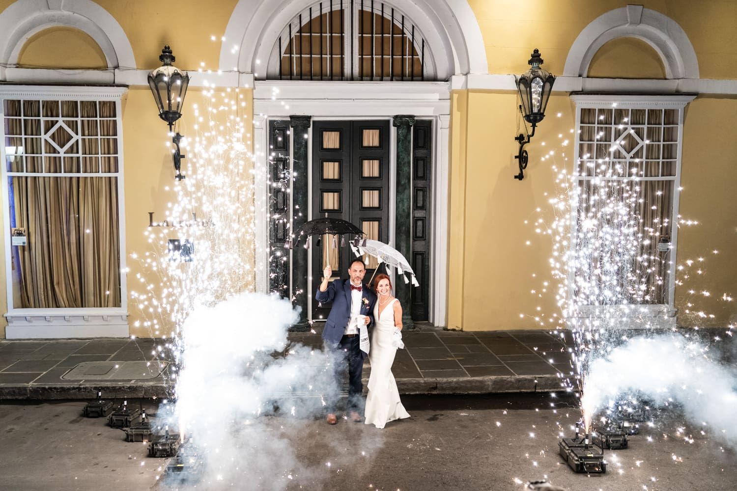 Couple standing in cold sparks at Latrobe's on Royal wedding