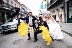 Bride and groom second line parade through French Quarter