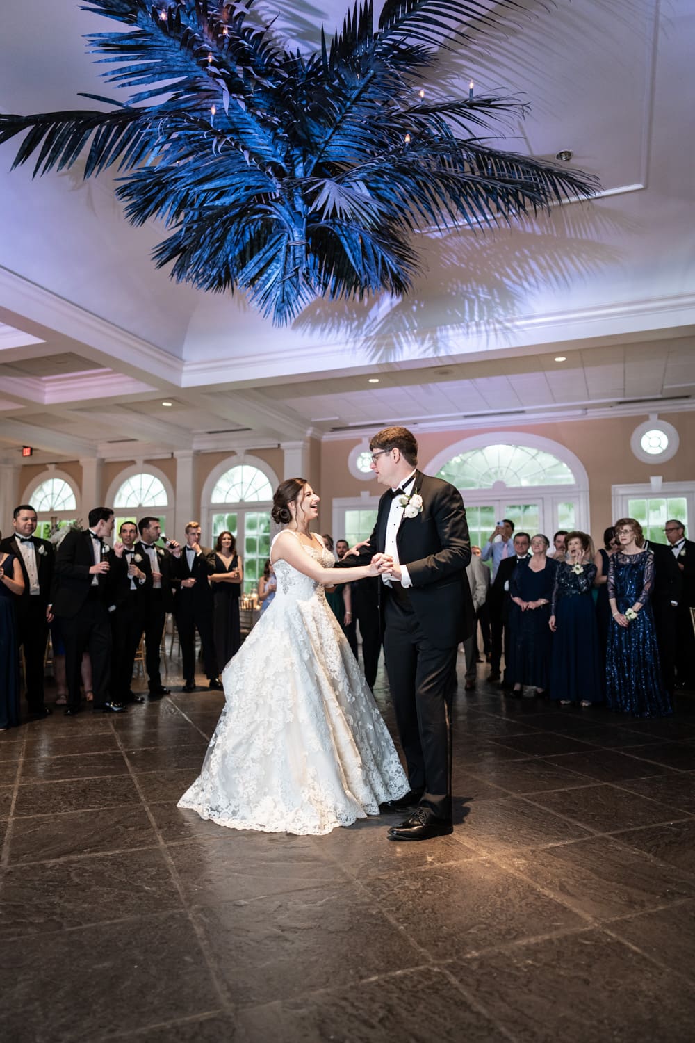 Bride and groom share first dance at Pavilion of the Two Sisters wedding reception in City Park