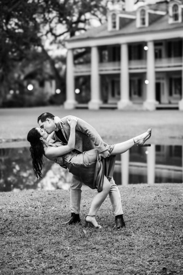 Couple dipping and kissing at Houmas House engagement portrait